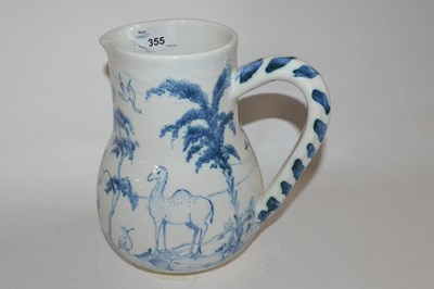 Lot 355 - A Isis Ceramics type jug decorated with a...