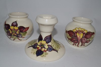 Lot 395 - A pair of Moorcroft small vases, decorated...