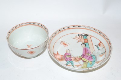 Lot 410 - A Lowestoft porcelain tea bowl and saucer with...