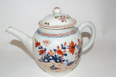 Lot 414 - A Lowestoft porcelain teapot decorated in...