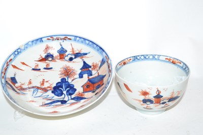 Lot 415 - A Lowestoft porcelain tea bowl and saucer in...