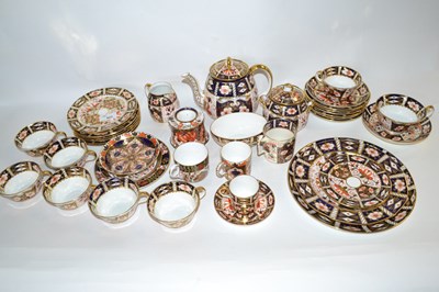Lot 427 - A Royal Crown Derby tea set in Imari style...