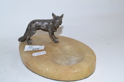Lot 468 - A 1930's onyx ashtray of oval shape mounted...