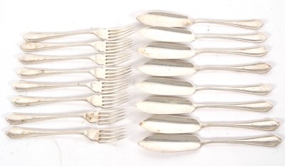 Lot 37 - Eight pairs of  George VI silver fish eaters,...