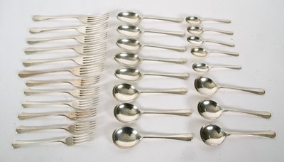 Lot 53 - A part set of Hanovarian rat-tail flat ware to...