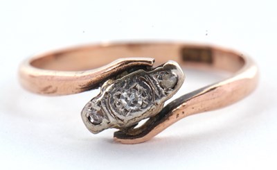 Lot 42 - A 9ct diamond ring, the three small round...