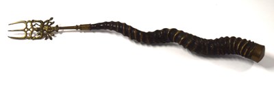 Lot 42 - 20th century brass toasting fork with antelope...