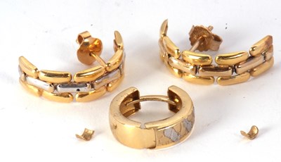 Lot 175 - A pair of unmarked yellow metal half hoop...