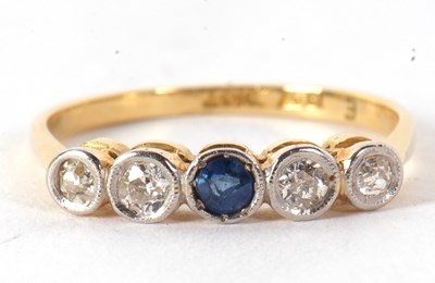 Lot 35 - A sapphire and diamond ring, set to centre...
