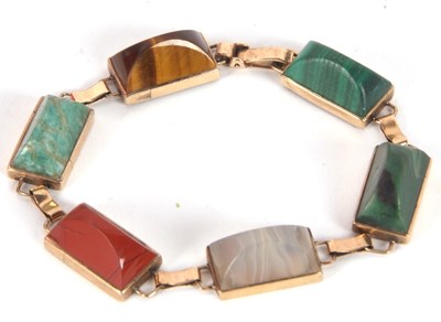 Lot 119 - A gemset bracelet, the rectangular sugar loaf...
