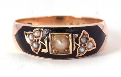 Lot 46 - An early 20th century black enamel and seed...