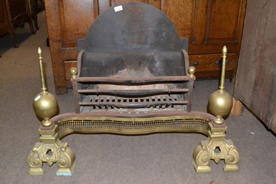 Lot 514 - A large cast iron and brass fire basket in the...