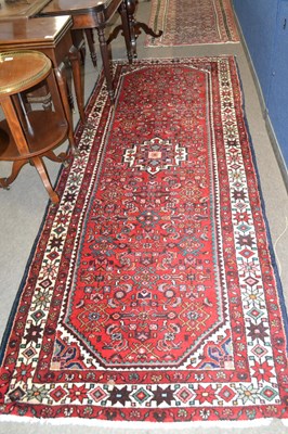 Lot 581 - A Turkish wool runner carpet with large...