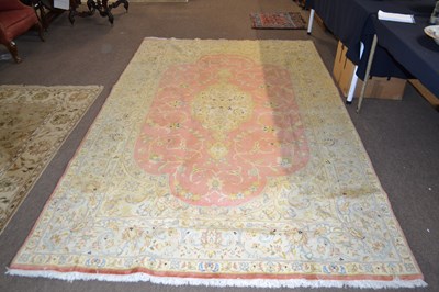 Lot 583 - A fine Tabriz carpet with a pale border...