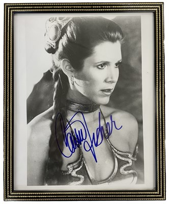 Lot 62 - A framed and glazed black and white photograph,...