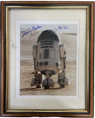 Lot 58 - A framed and glazed colour photograph bearing...