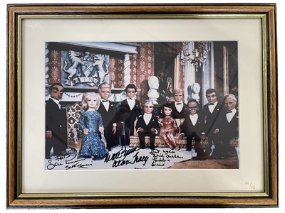 Lot 41 - A framed and glazed colour photograph bearing...
