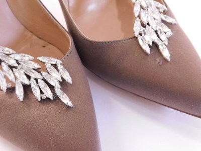 Lot 145 - A pair of Manolo Blahnik beige satin and...