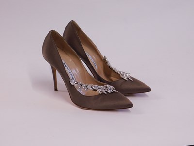 Lot 145 - A pair of Manolo Blahnik beige satin and...