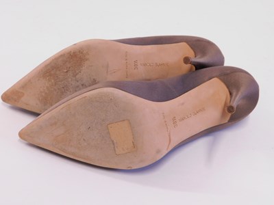Lot 145 - A pair of Manolo Blahnik beige satin and...