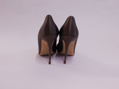 Lot 145 - A pair of Manolo Blahnik beige satin and...