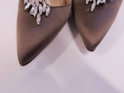 Lot 145 - A pair of Manolo Blahnik beige satin and...