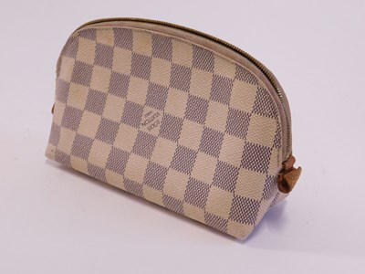 Lot 130 - A Louis Vuitton purse, half moon shape with...
