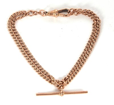 Lot 242 - A yellow metal pocket watch chain stamped on...