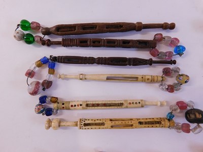 Lot 171 - A quantity of lace bobbins, to include pierced...