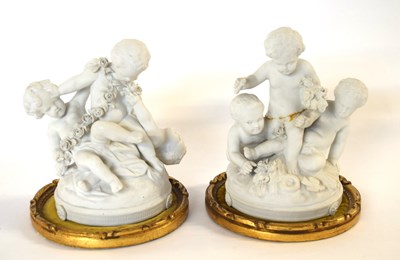 Lot 309 - A pair of sevre style Parion groups of...