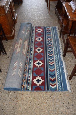 Lot 314 - A 20th Century patterned floor rug