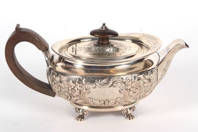 Lot 97 - A George III silver teapot of oval form and...