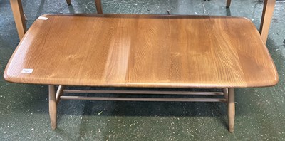 Lot 197 - An Ercol light elm coffee table of rectangular...