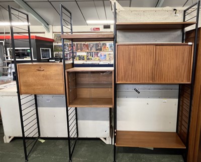 Lot 207 - A Ladderax teak and iron framed room divider...