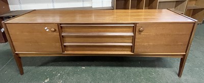 Lot 210 - A mid Century teak sideboard with two end...