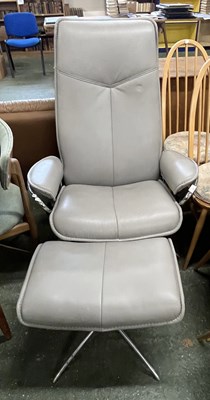 Lot 221 - An Ekorne grey leather armchair and...