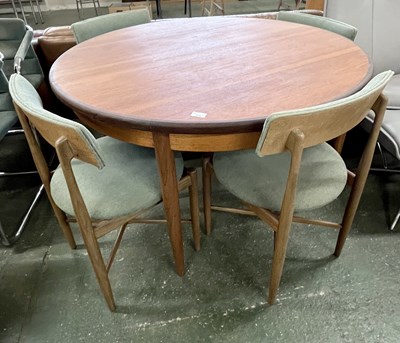Lot 222 - A G-Plan teak extending dining table and four...