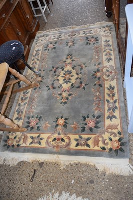 Lot 292 - A Chinese floral patterned carpet