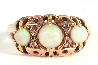 Lot 83A - A three stone opal ring, the three graduated...