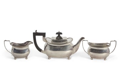 Lot 296 - A matched three piece tea service of plain...