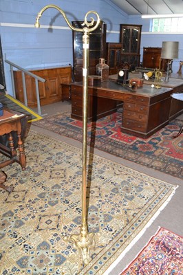 Lot 501 - Brass standard lamp with three footed base,...