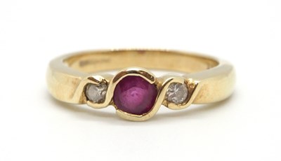Lot 22 - A 9ct ruby and diamond ring, the round collet...
