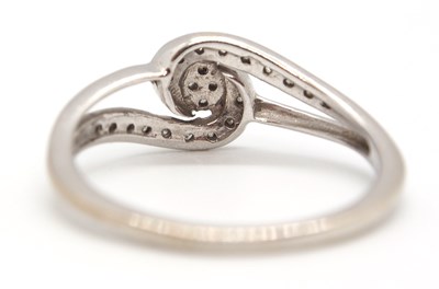 Lot 17 - A 9ct diamond ring, set to centre with four...