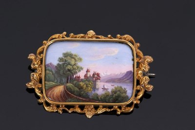 Lot 324 - A 19th century painted enamel brooch, the...