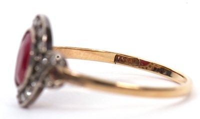 Lot 35 - A 15ct ruby and diamond ring, the oval mixed...
