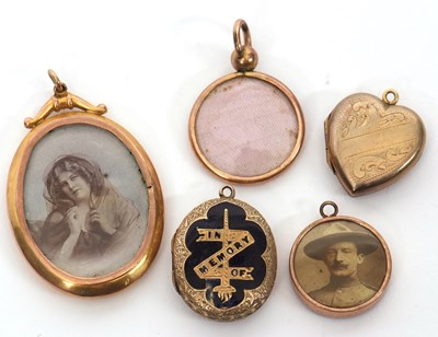 Lot 264 - Five yellow metal lockets: to include a heart...