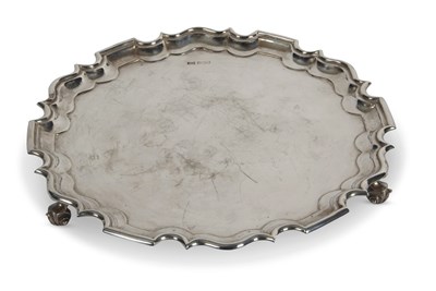 Lot 271 - A George V silver salver of plain design with...