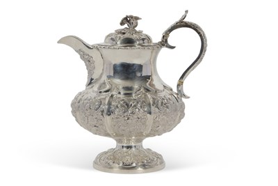 Lot 273 - George IV silver hot water jug profusely...
