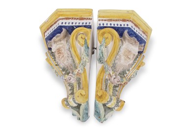 Lot 12 - Two Italian faience style corner shelves, both...
