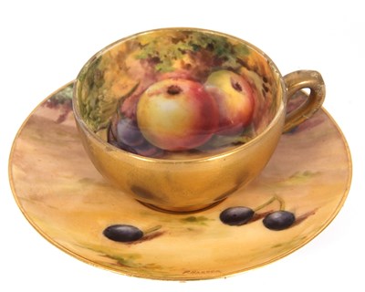 Lot 21 - A miniature Worcester porcelain cup and saucer...